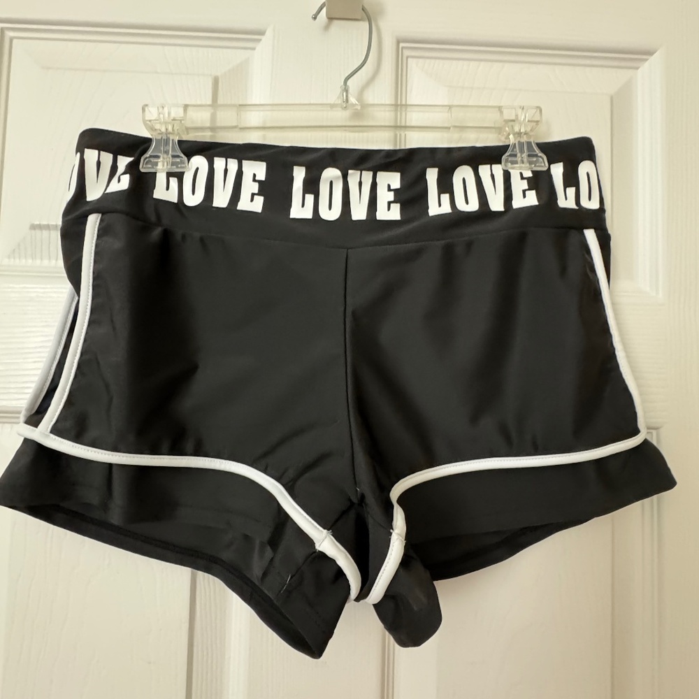 Love athletic shorts / Black with white trim. size L